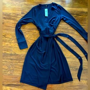Navy Blue Ann Taylor long sleeve  wrap dress.  Size 4 New with tags. Very nice